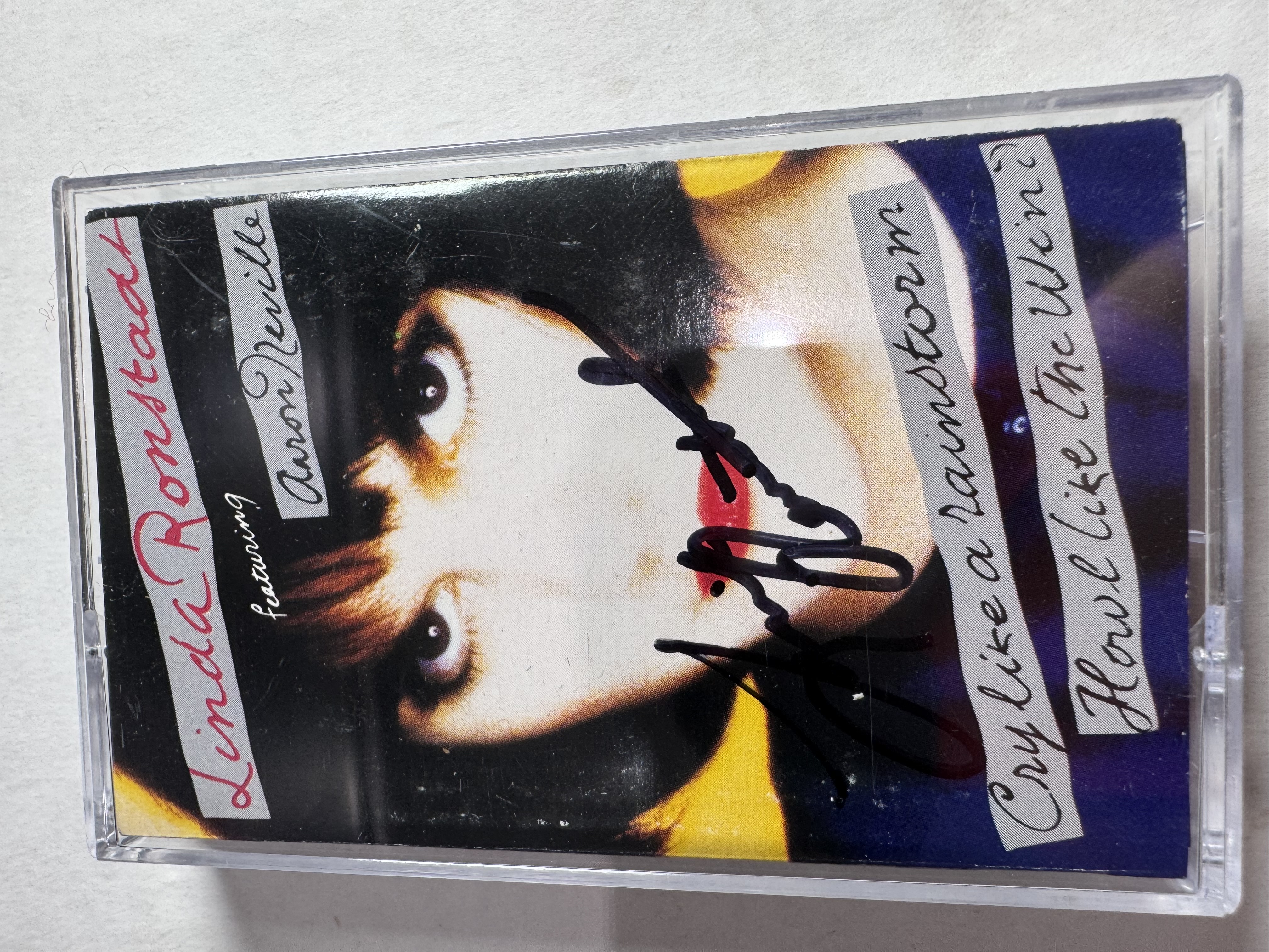 B112872 Linda Ronstadt cry like a rain storm how like the wind signed cassette