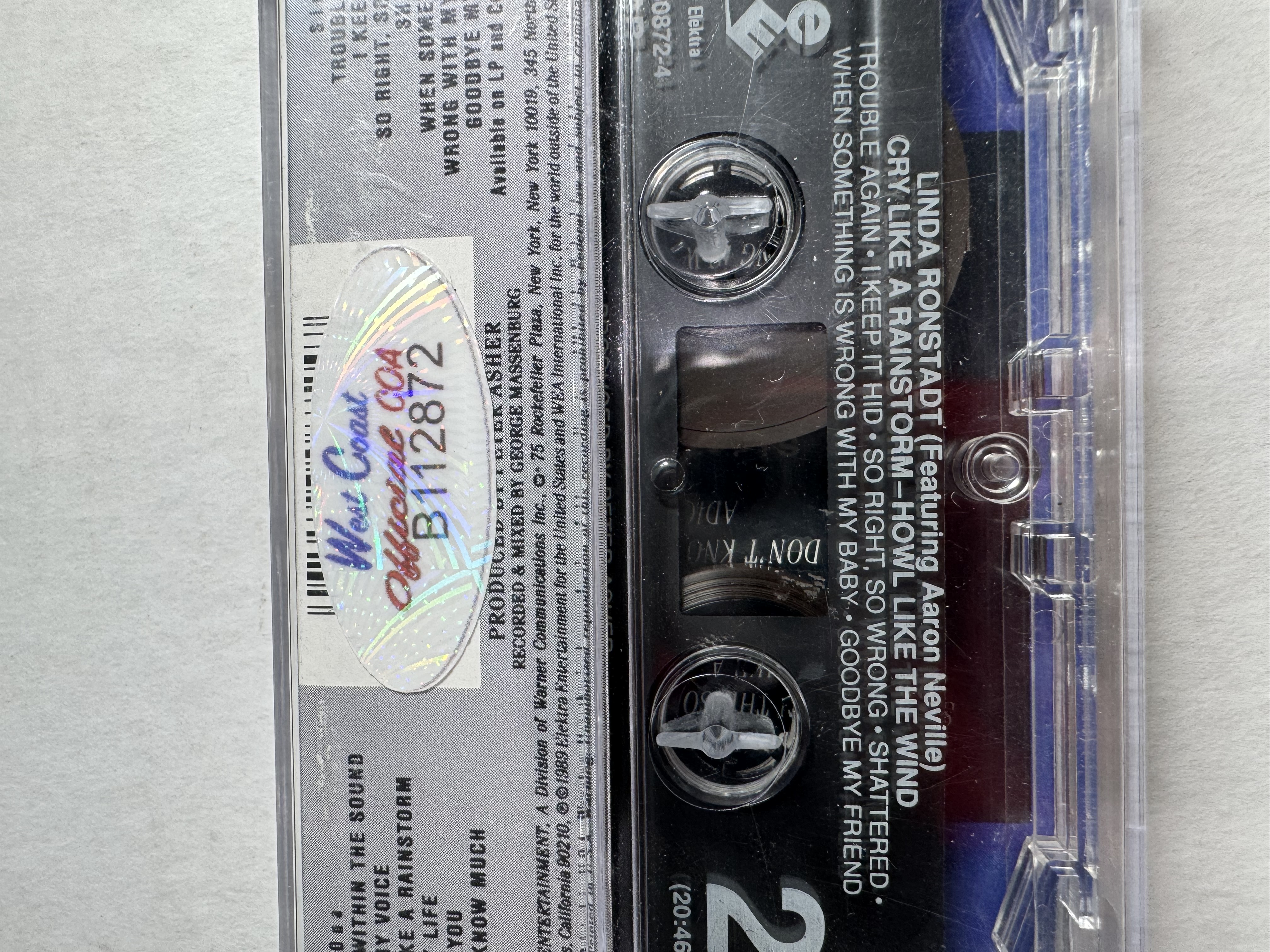 B112872 Linda Ronstadt cry like a rain storm how like the wind signed cassette