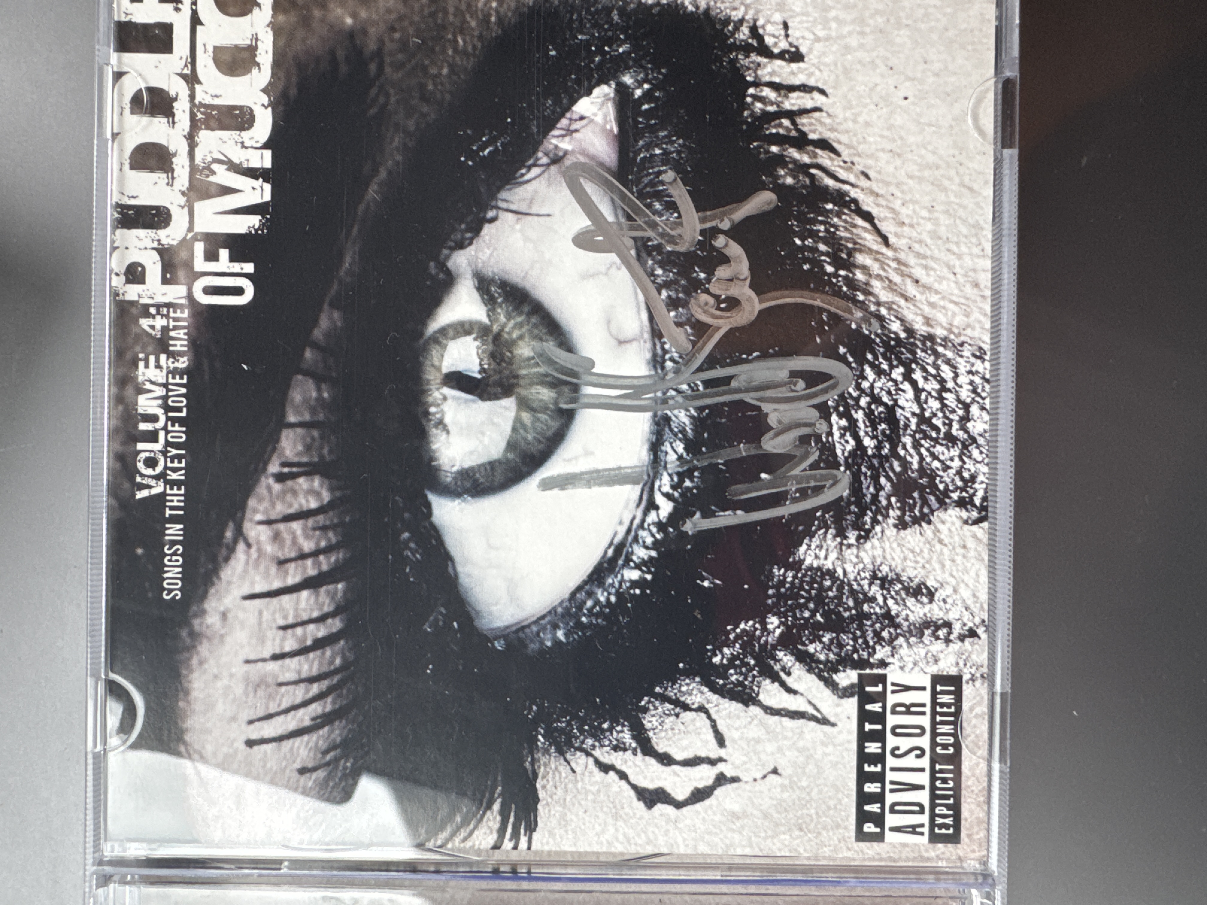 B 112805 Puddle of Mudd songs in the key of love and hate. Signed by Wes Scantlin.