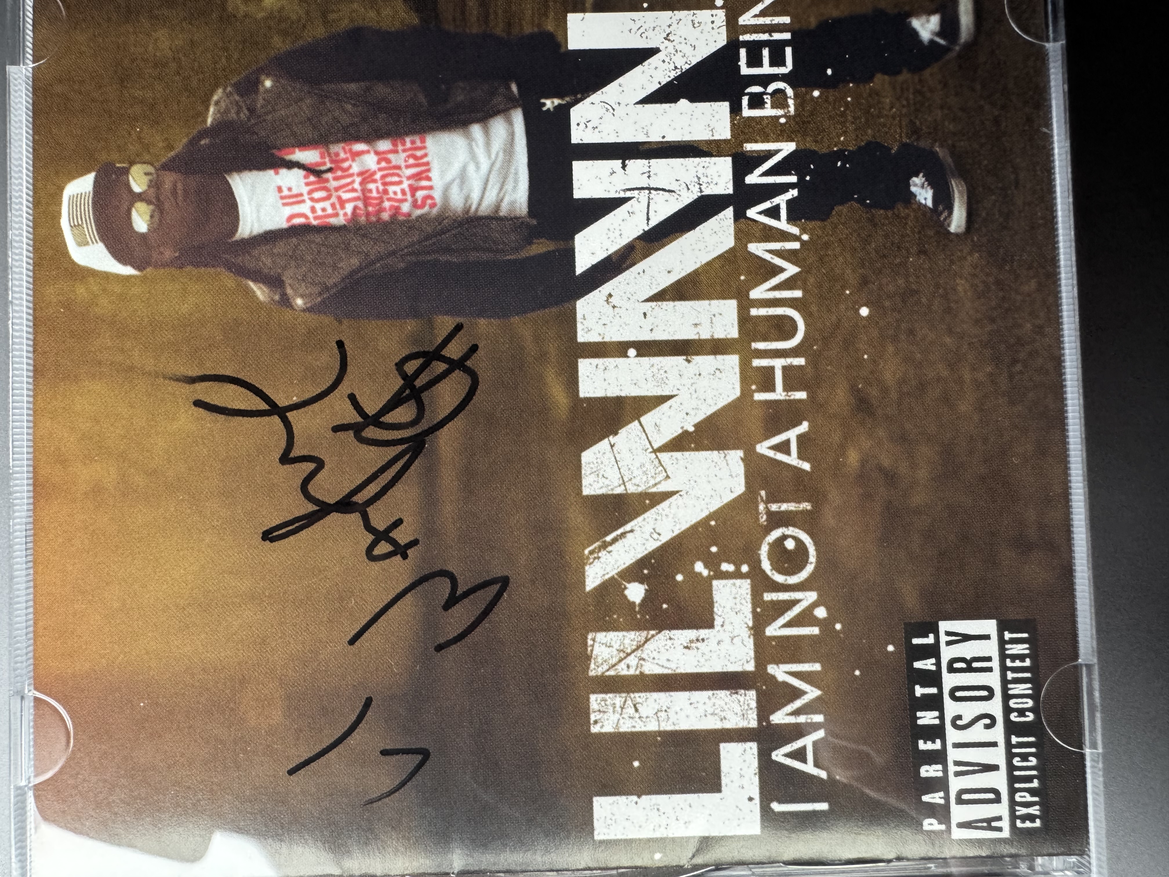 B112614 Lil Wayne, I am not a human being signed CD booklet