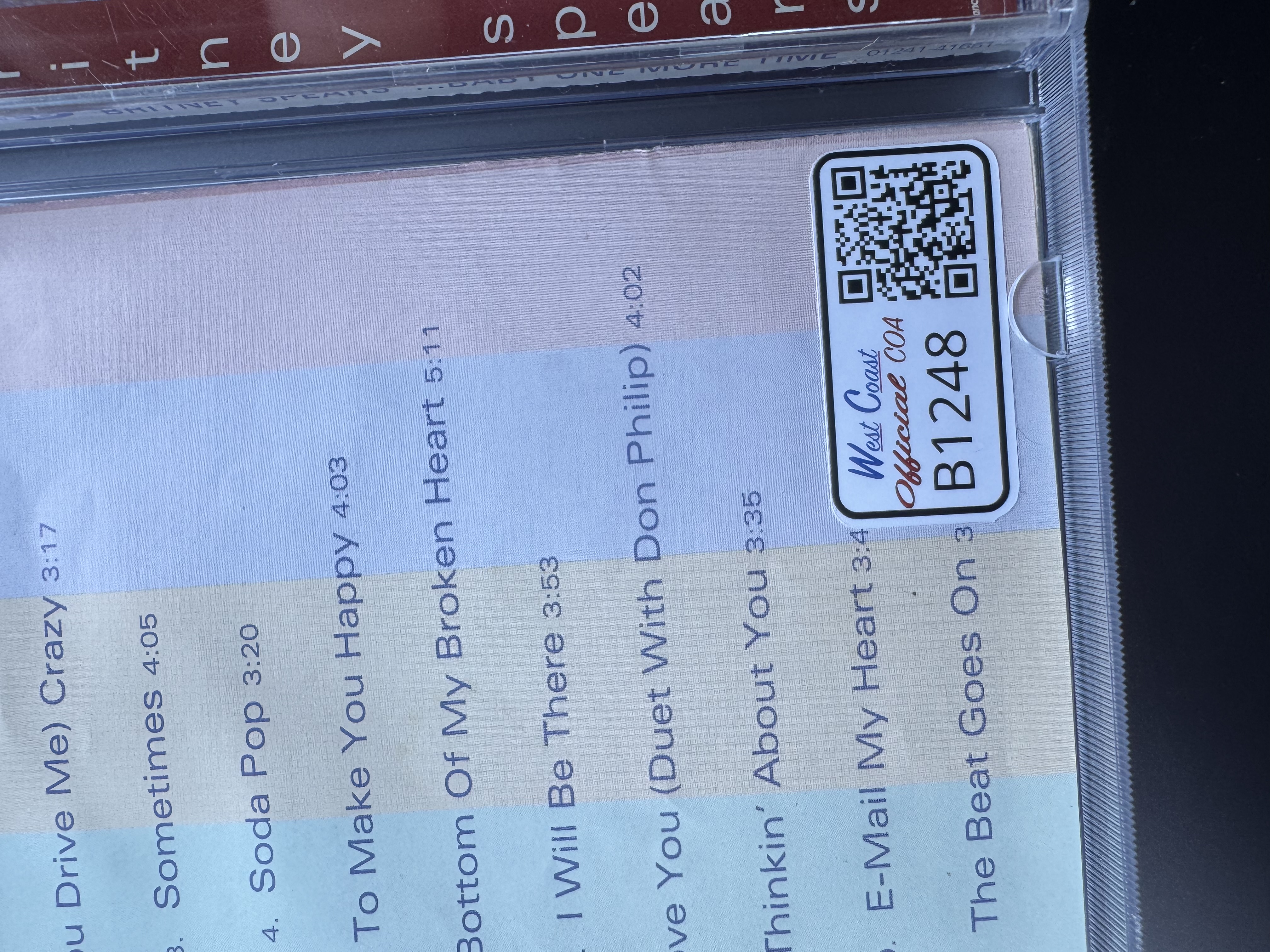 B1248 Britney Spears …Baby one more time signed CD booklet 