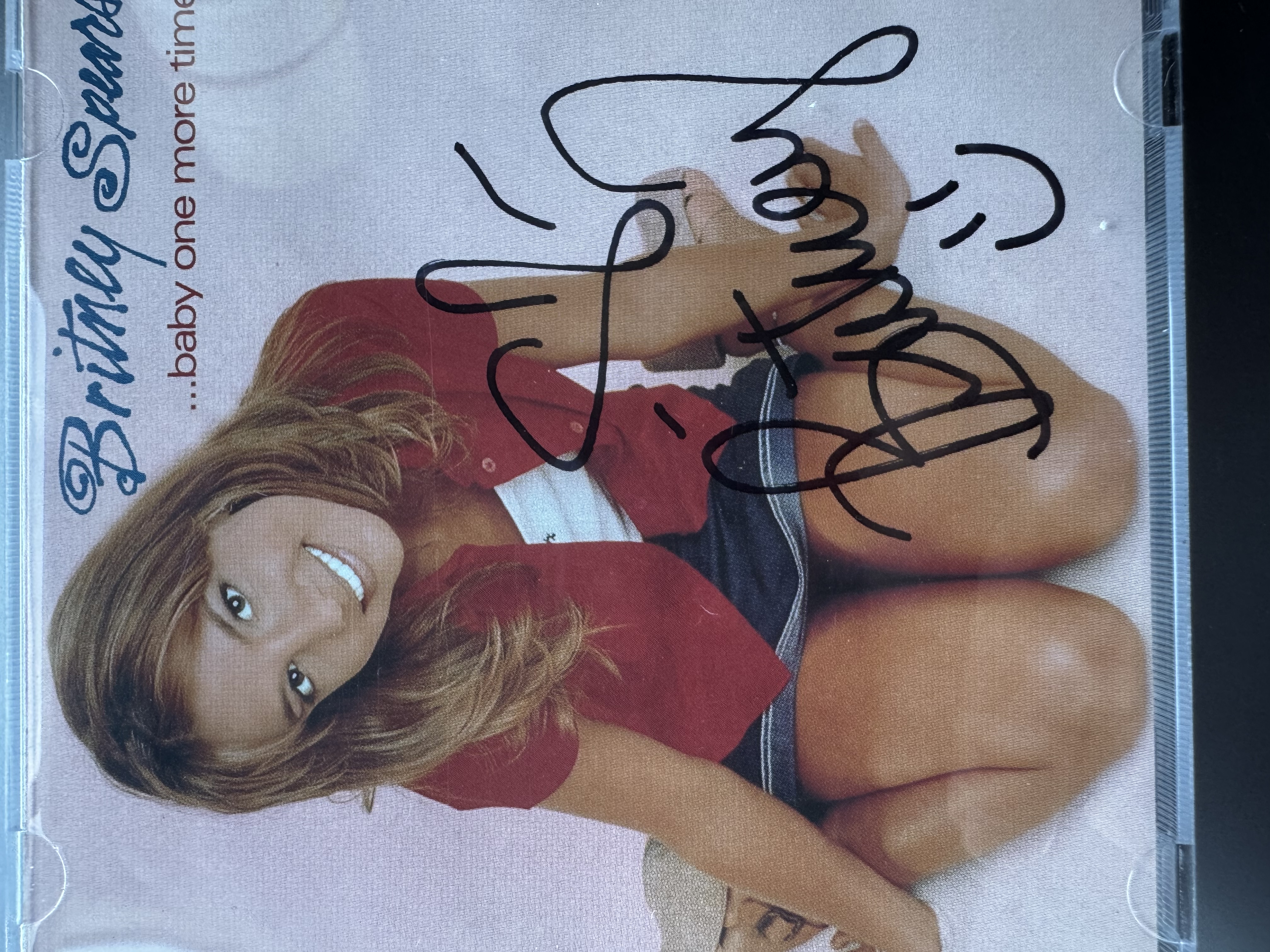 B1248 Britney Spears …Baby one more time signed CD booklet 