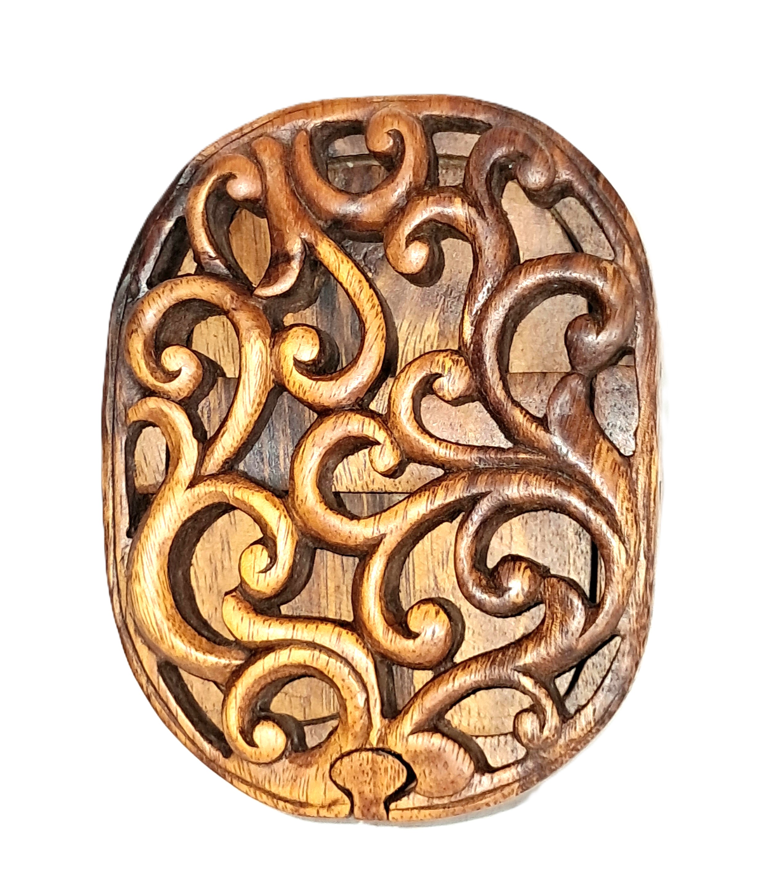 puzzle jewelry box with Celtic design, wood carving.