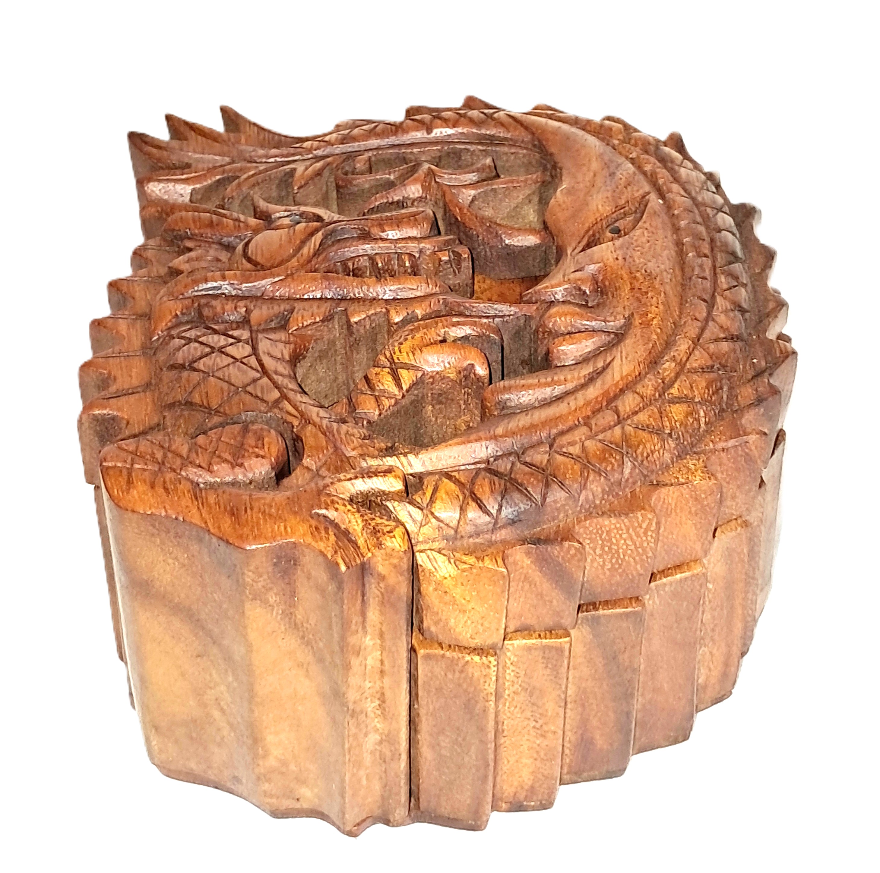 puzzle jewelry box with dragon-moon design.