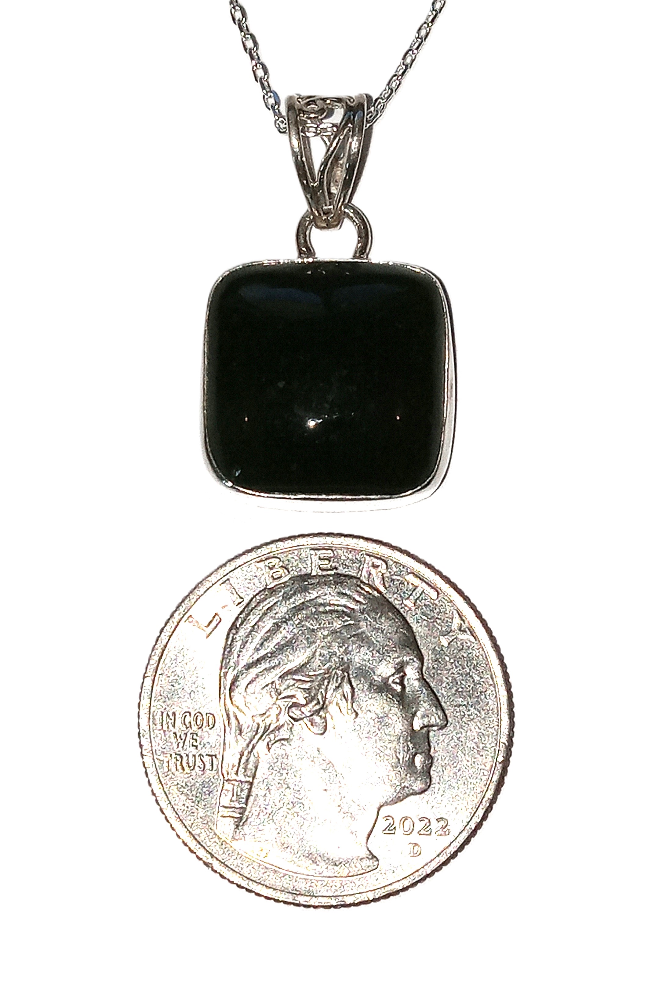 Jade pendant set in sterling silver.