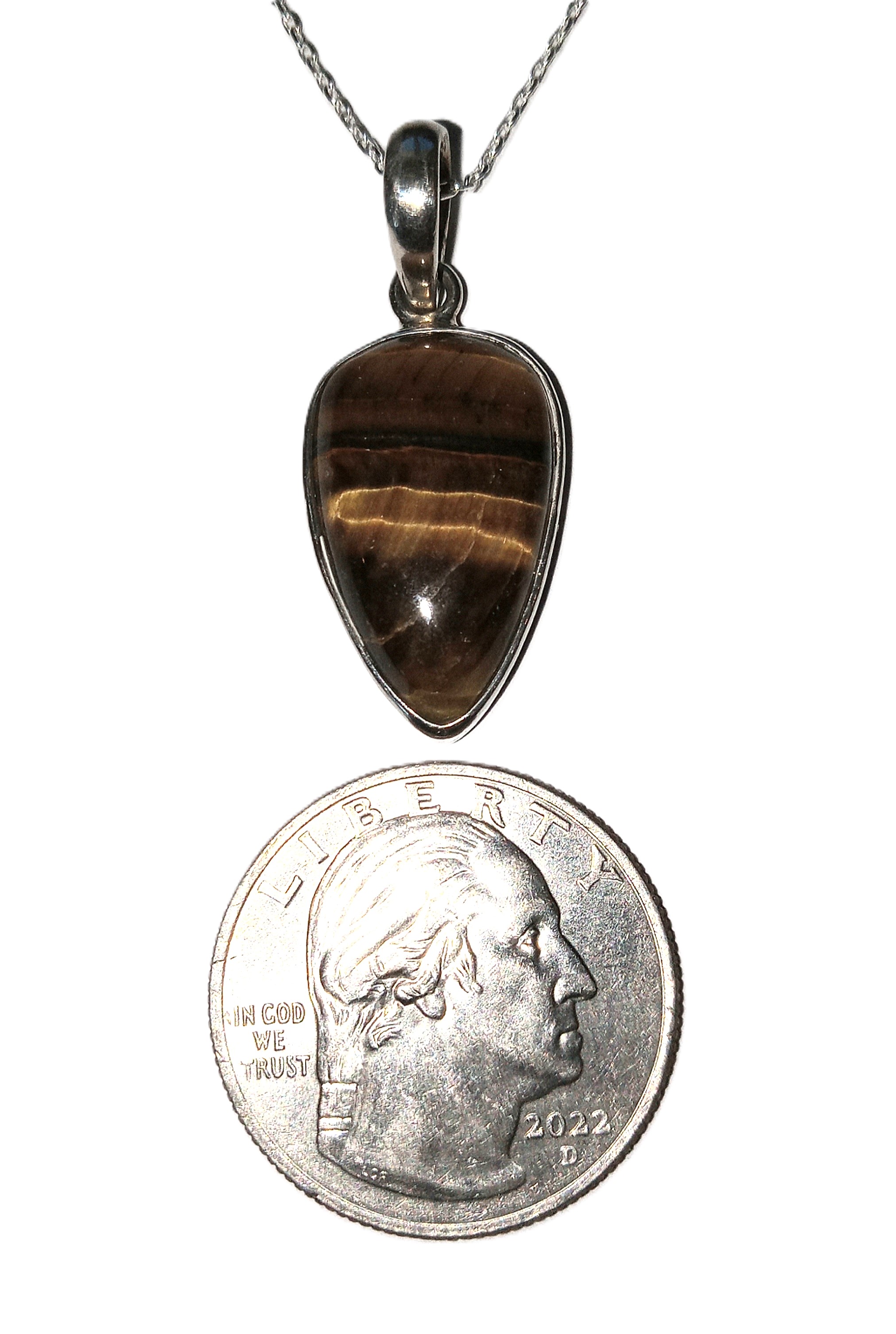 Tiger's Eye pendant set in sterling silver.