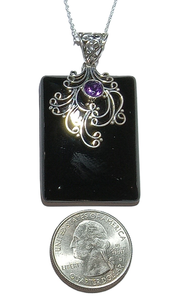 Onyx & Amethyst pendant in sterling silver.