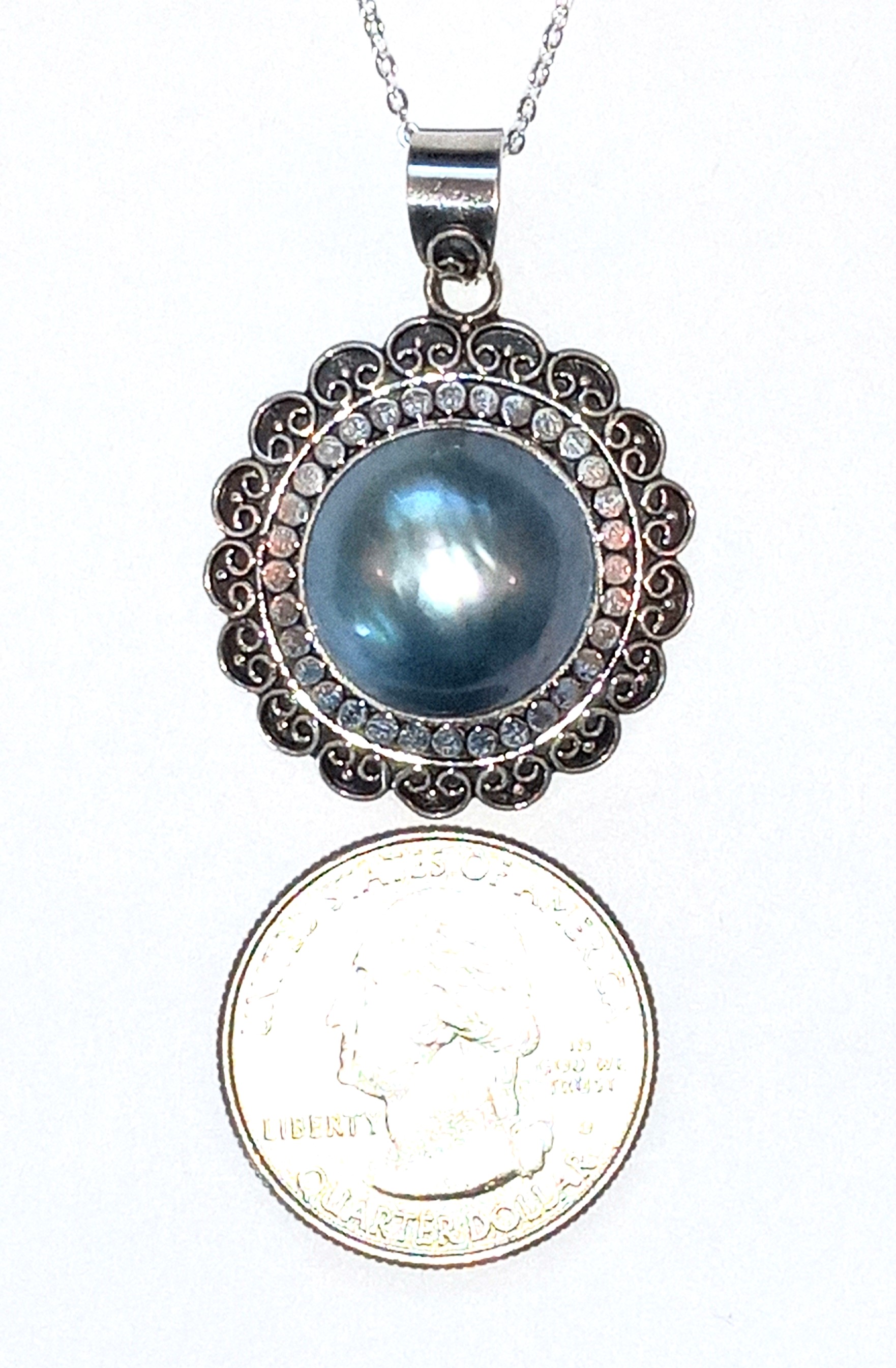 Mabe pendant in sterling silver.
