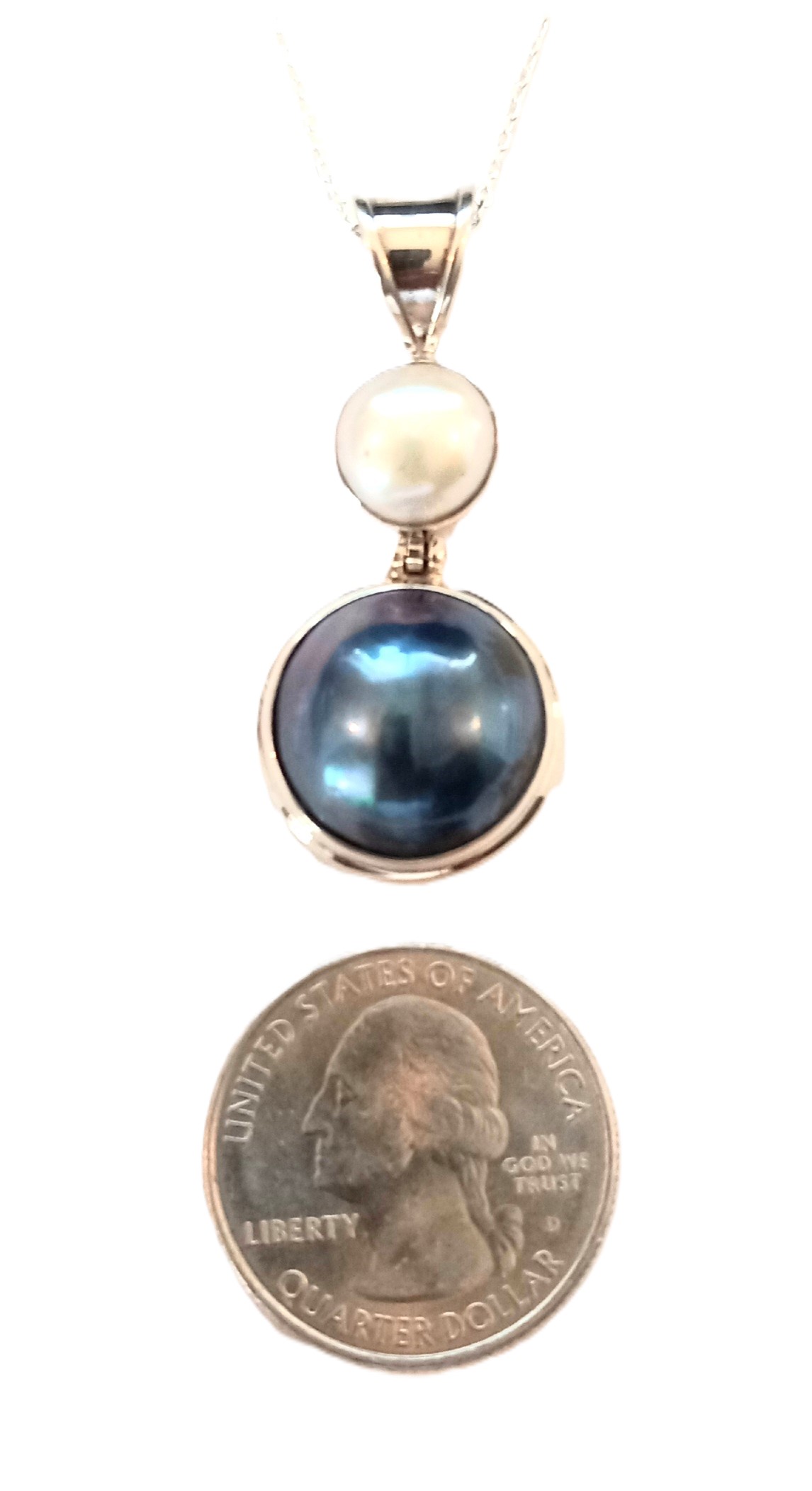 Mabe and Pearl pendant in sterling silver.