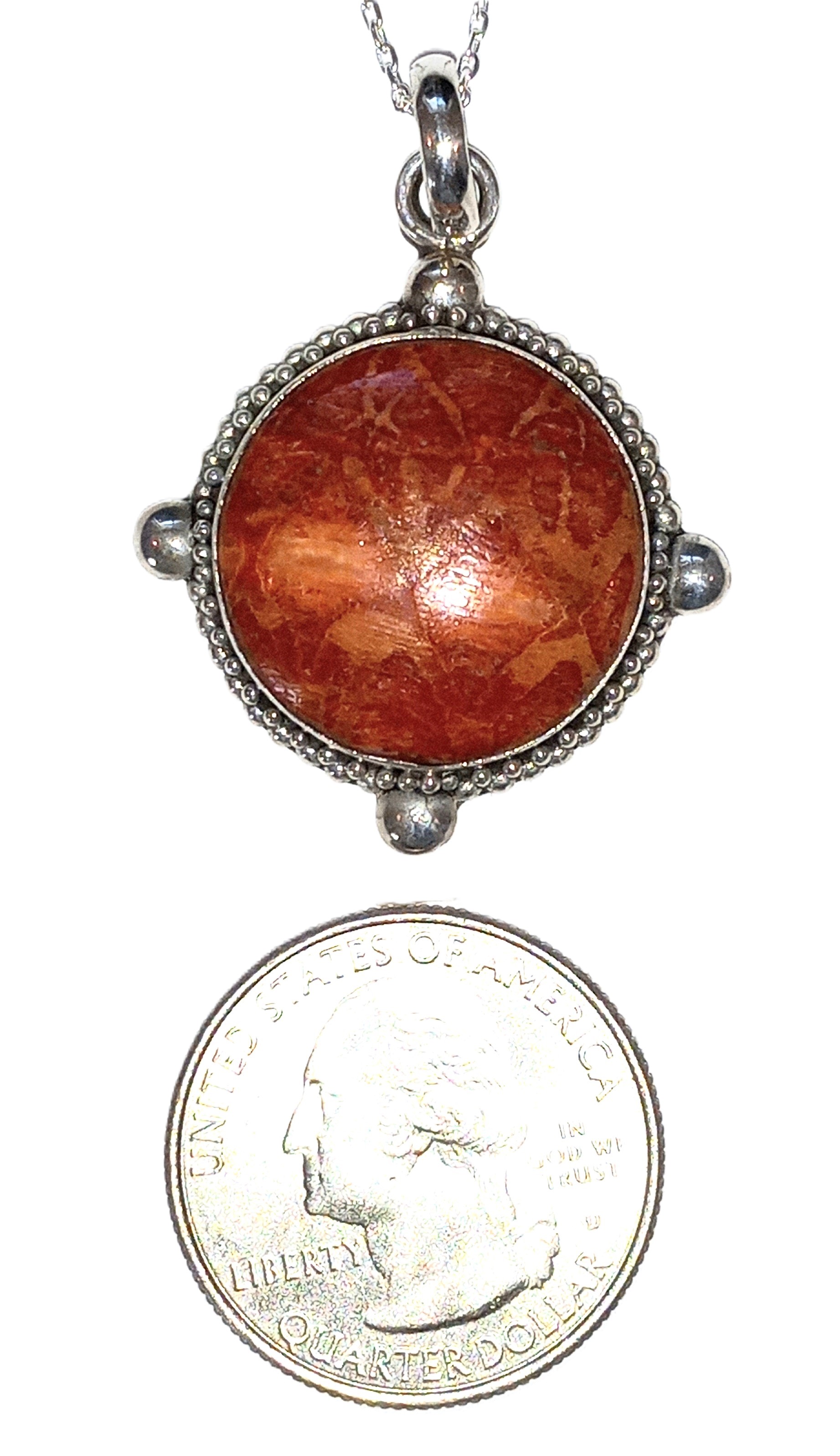 Coral pendant in sterling silver (char).