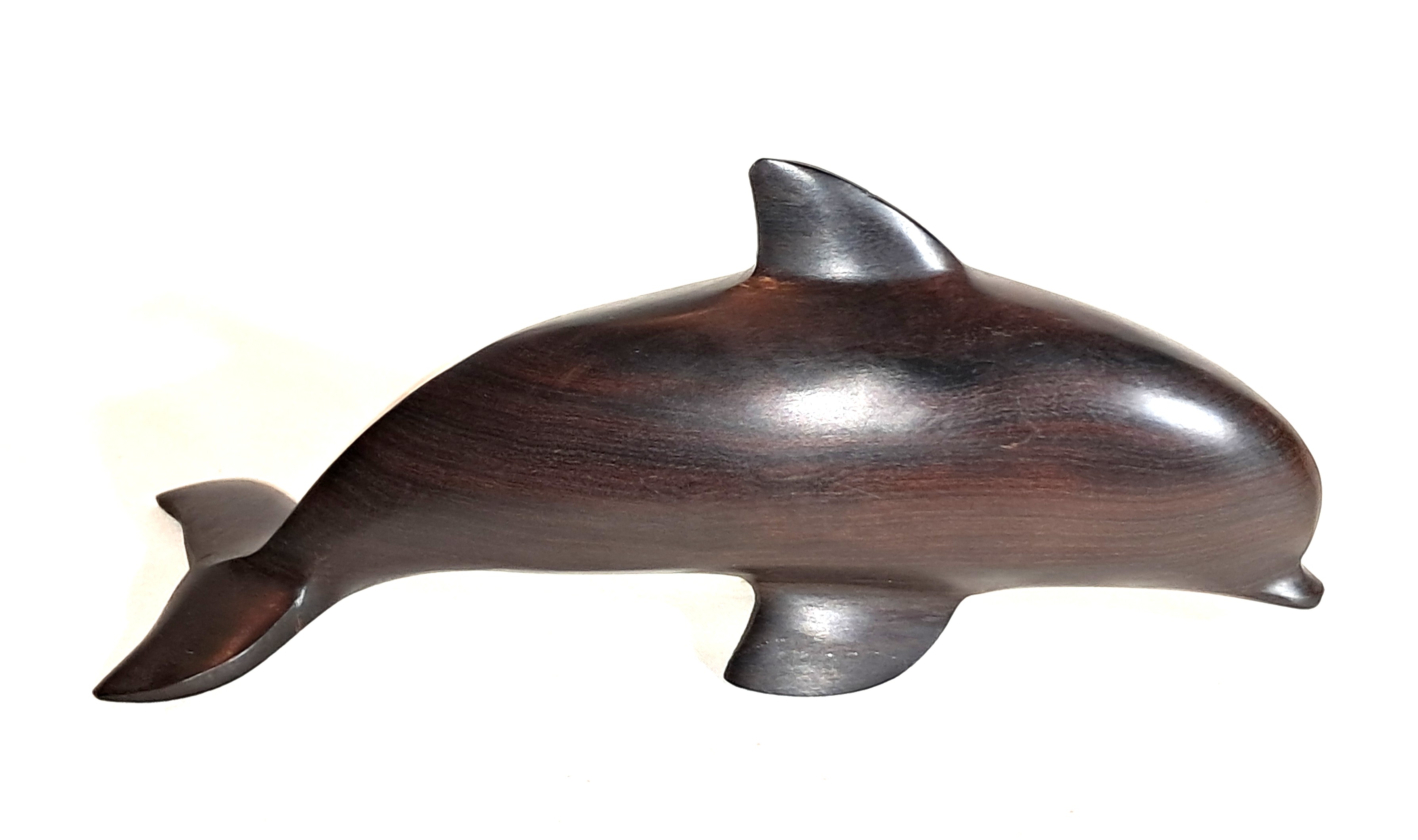 Ironwood dolphin sculpture.