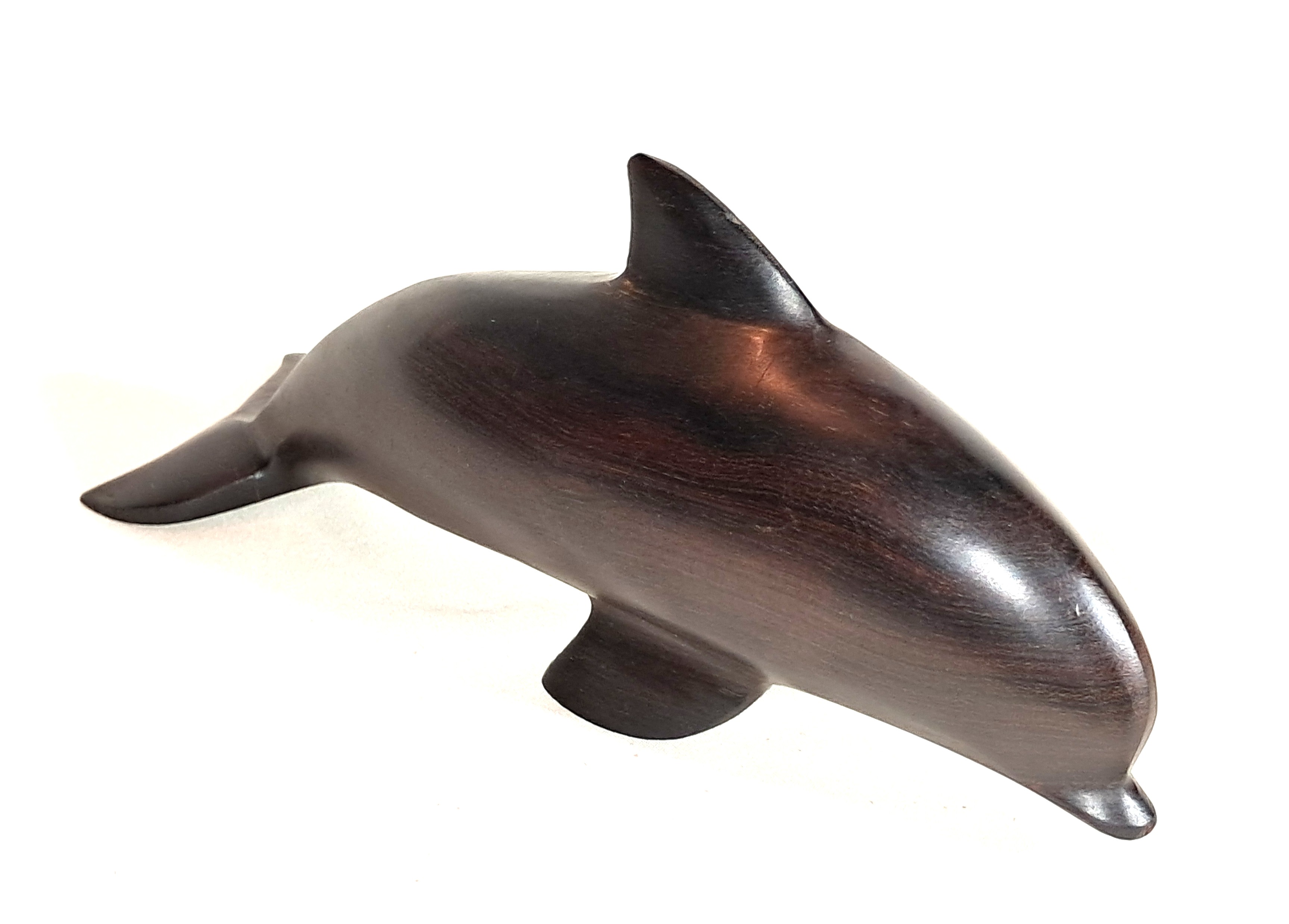 Ironwood dolphin sculpture.