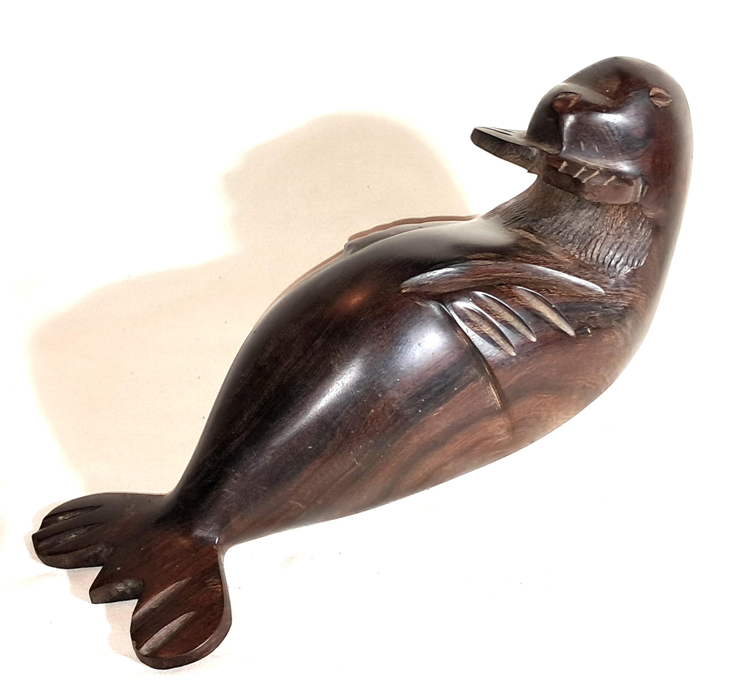 Ironwood otter sculpture.