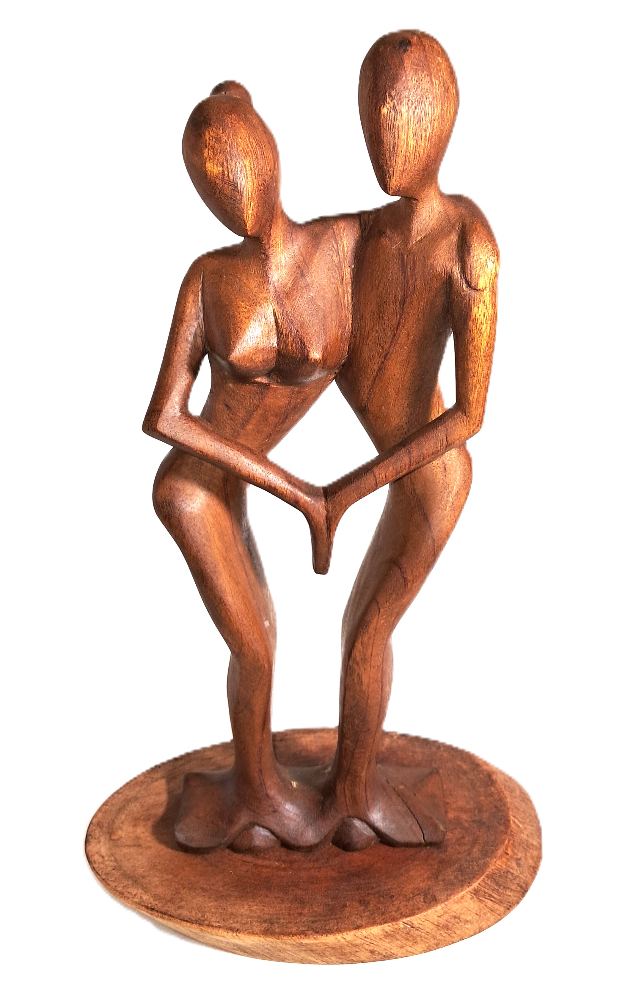 Couple dancing, wood sculpture.