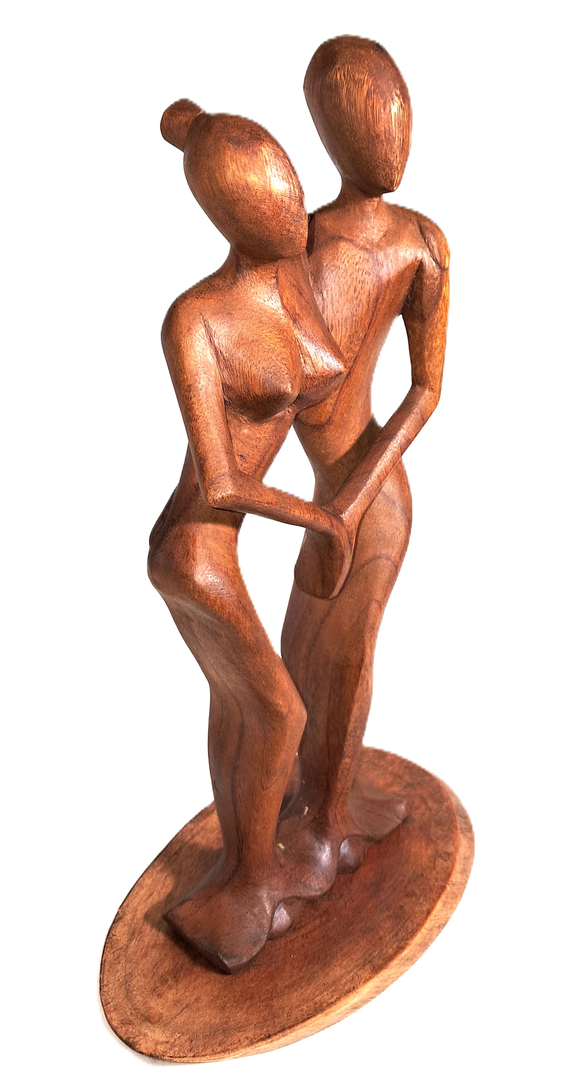 Couple dancing, wood sculpture.