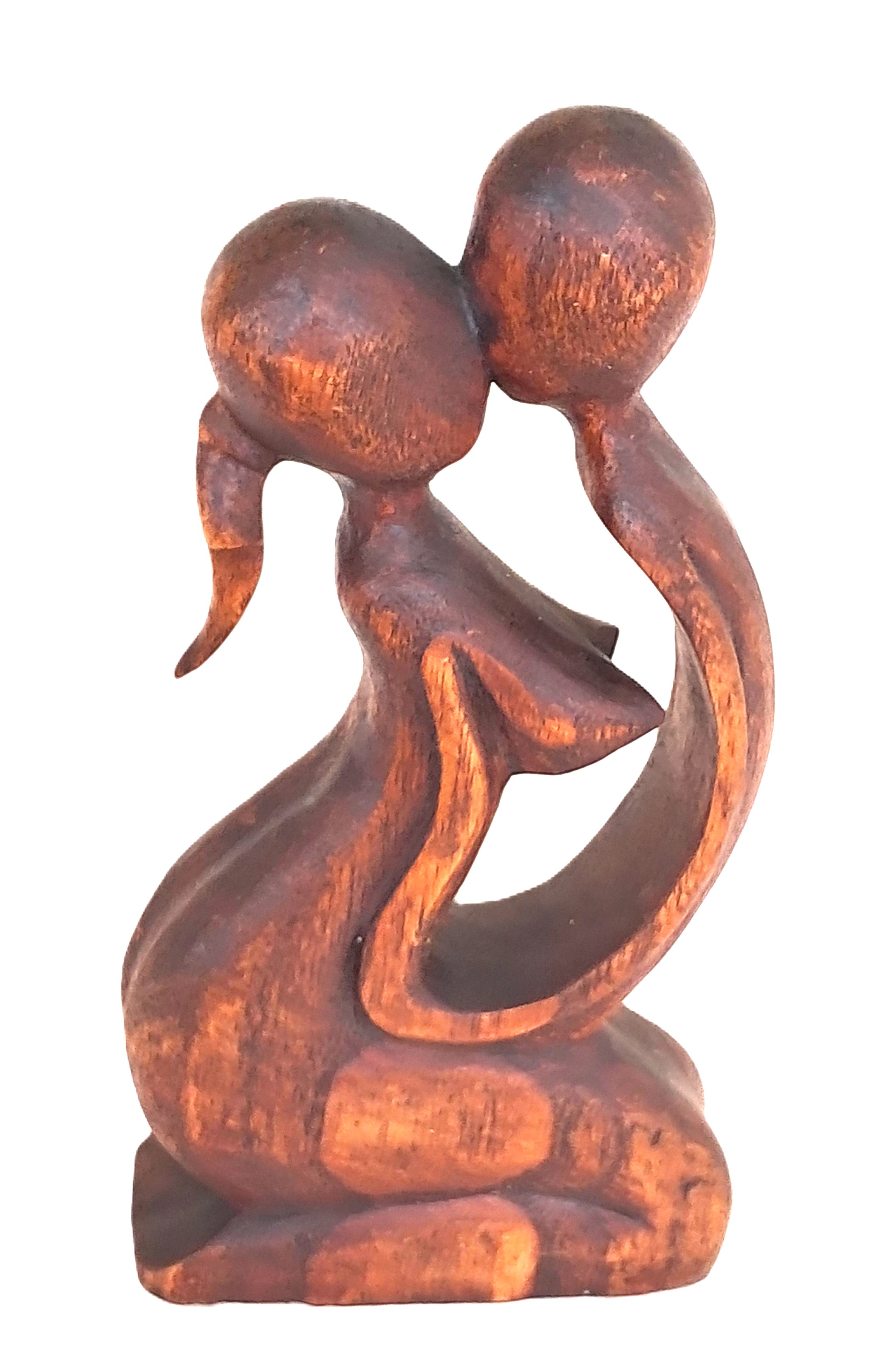 Couple in love, wood sculpture.