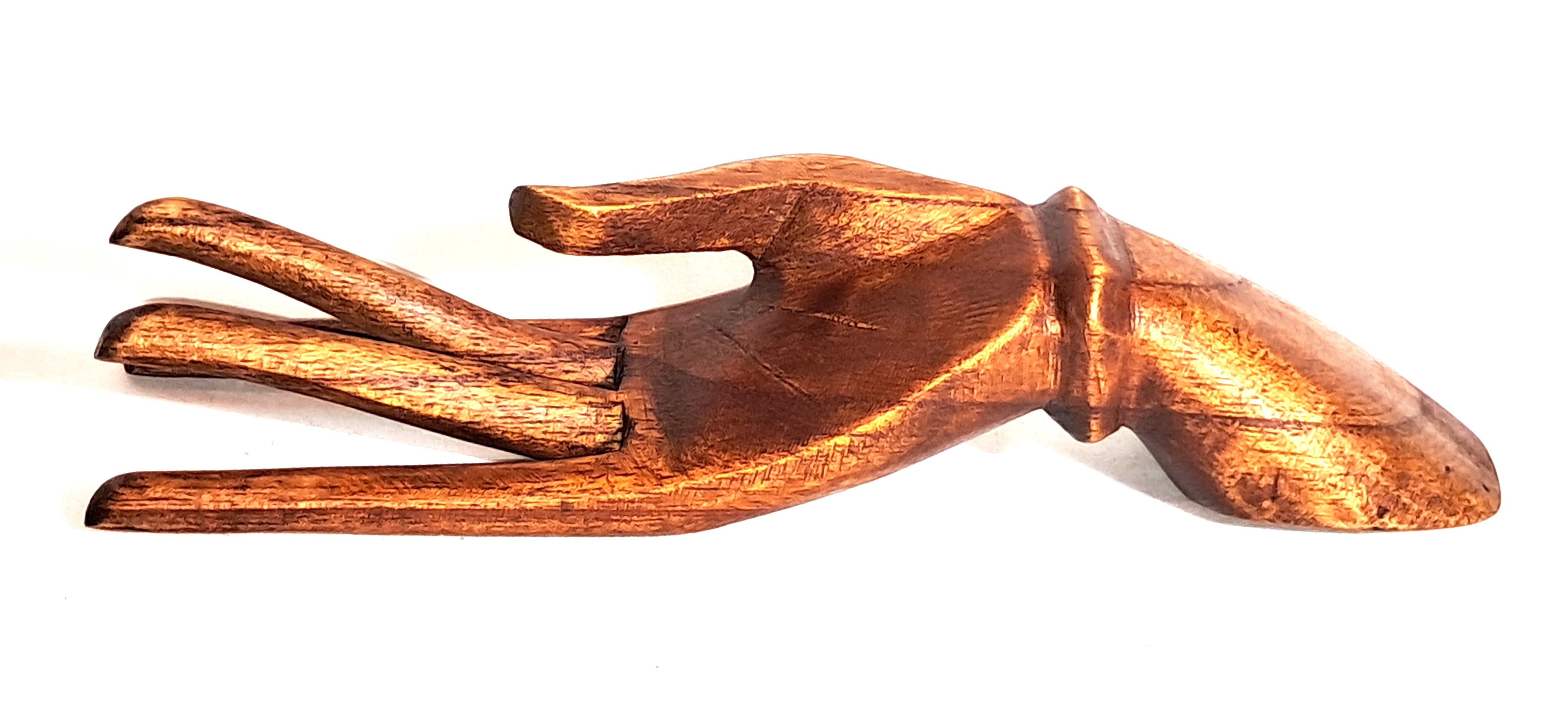 Hand laying down, ring holder, wood sculpture.