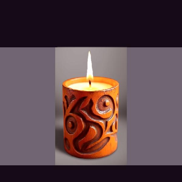 Pillar candle in wood carving holder