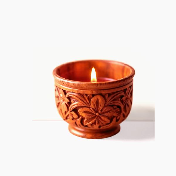 Wooden votive holder with candle