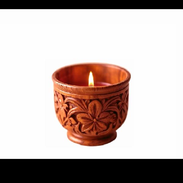 Wooden votive holder with candle