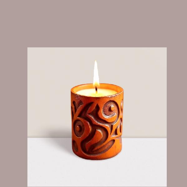 Pillar candle in wood carving holder