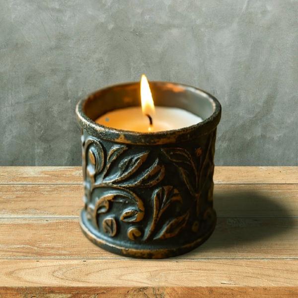 Pillar candle in rustic jar
