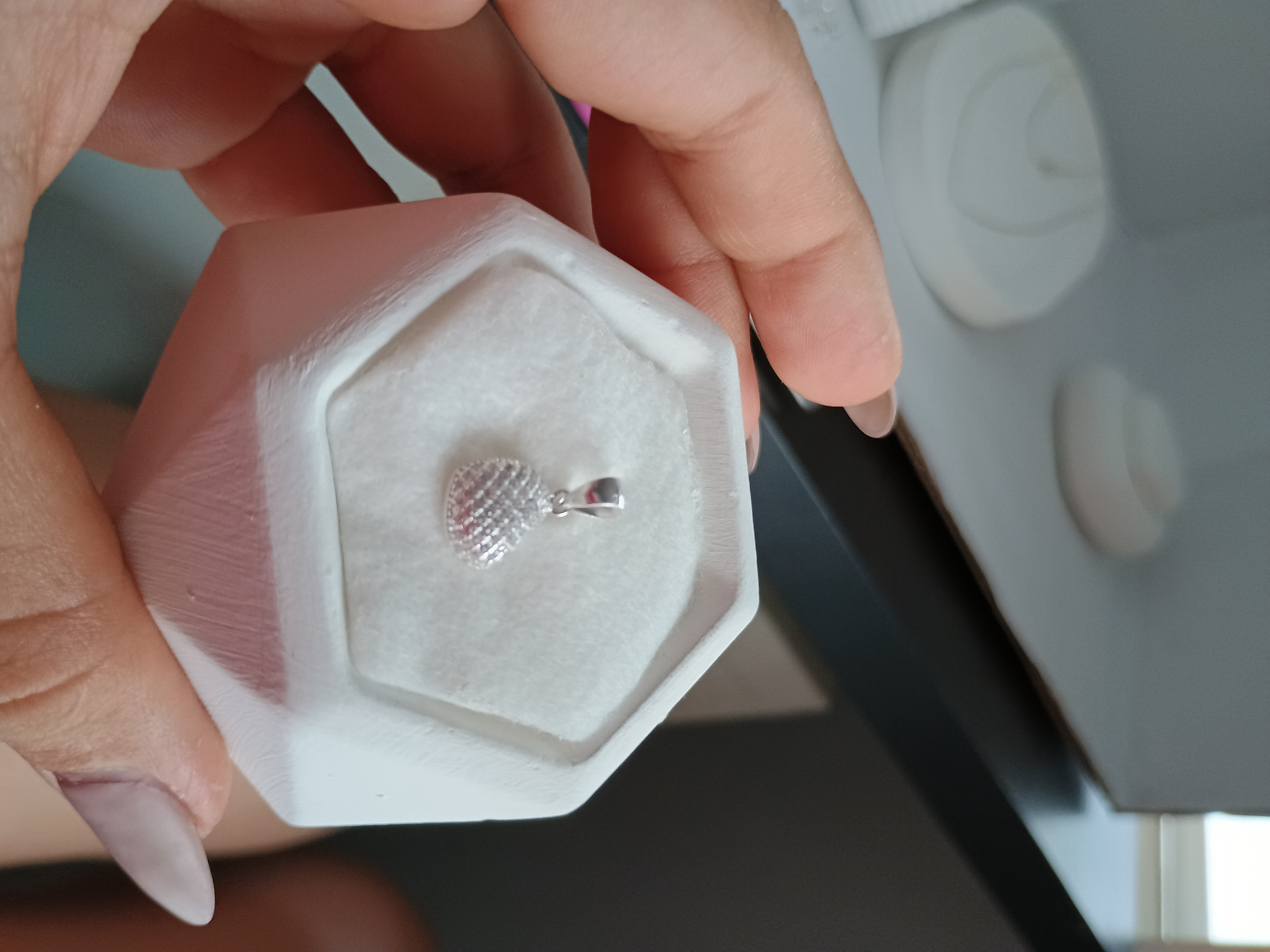 Dije de plata en forma de corazon