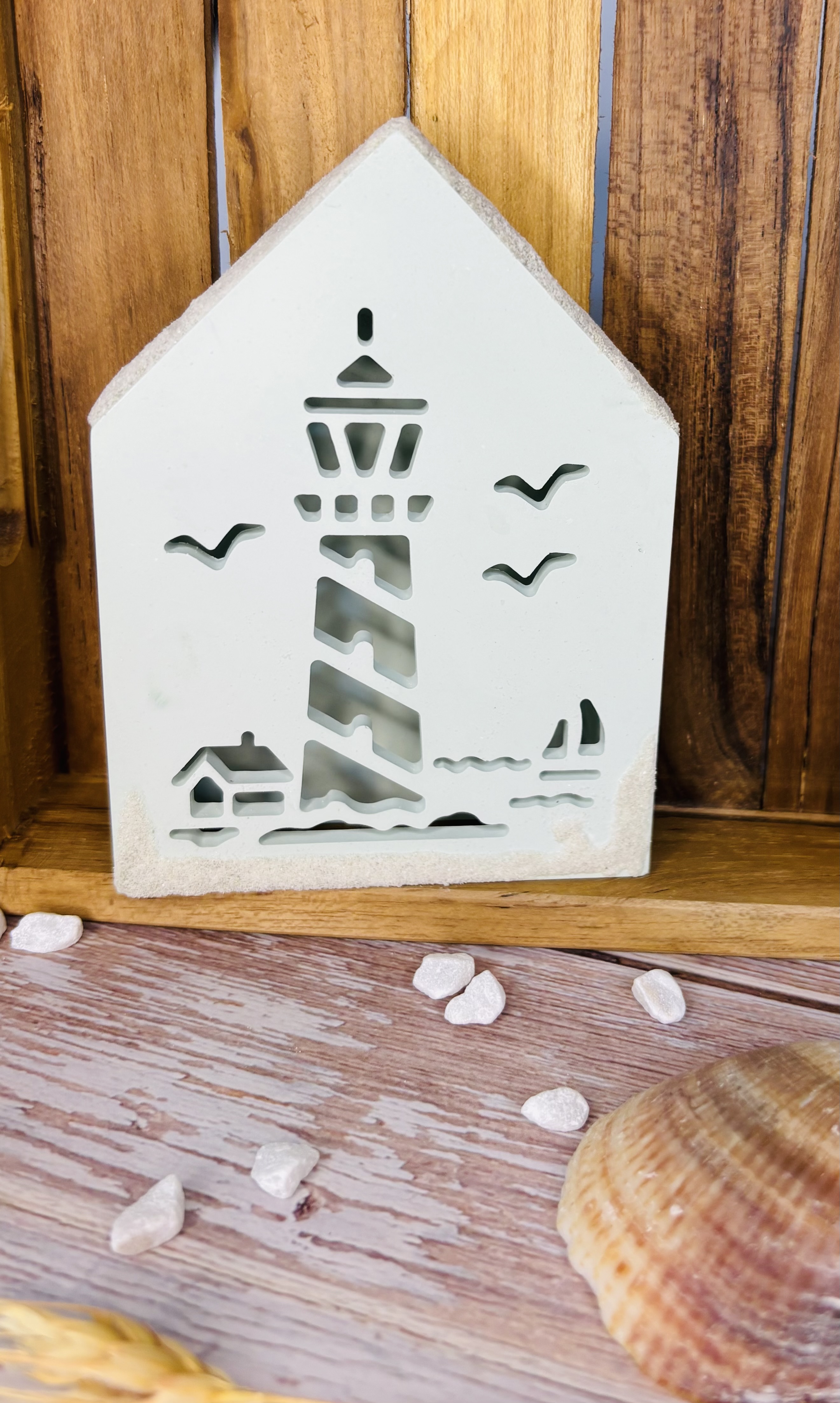 Dekoratives Leuchtturmhaus