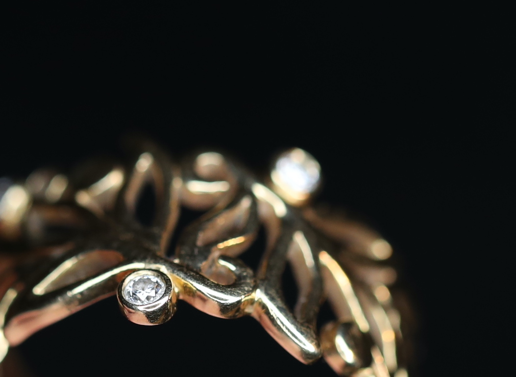 Geltono aukso žiedas su deimantais