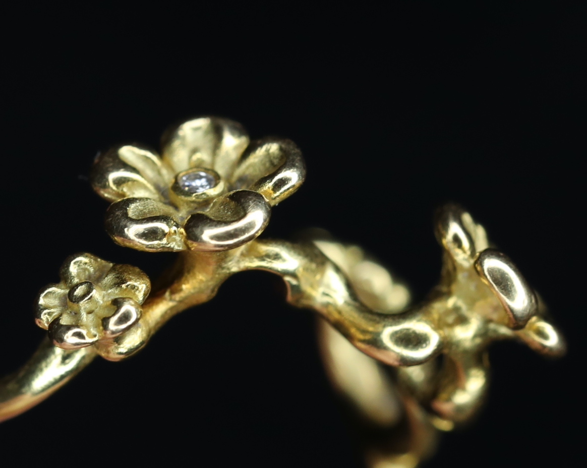 Geltono aukso žiedas su deimantais