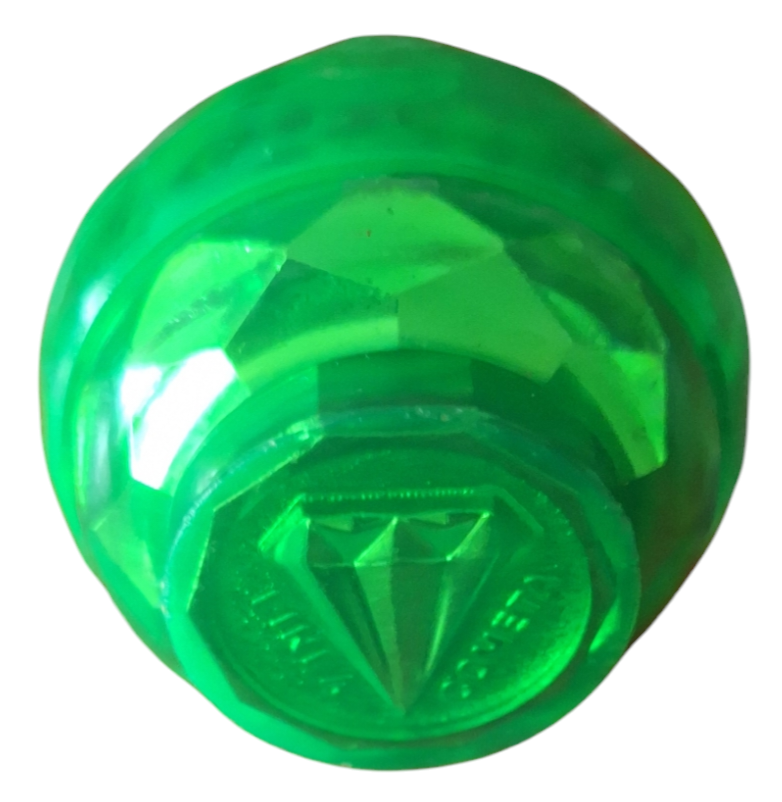 Trompo de plástico verde con punta metálica