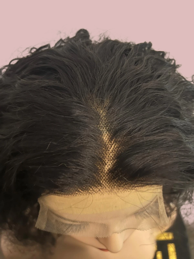 Stella curly pruik echt haar in kleur 1b