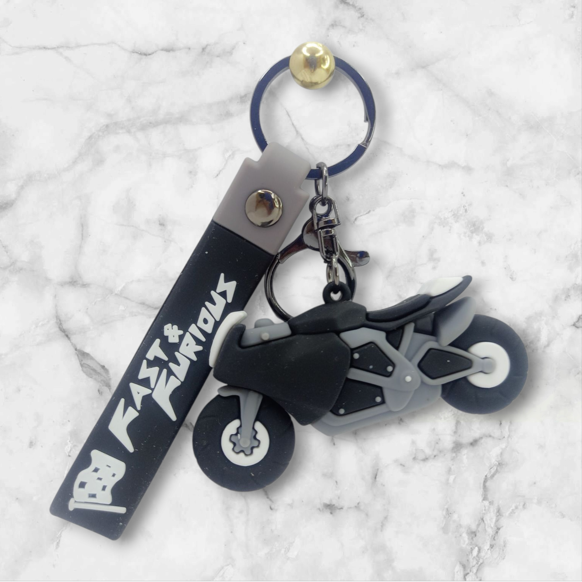Stylish grey & black motorcycle keychain with rubber strap – perfect for biker keys, backpacks, or gifting