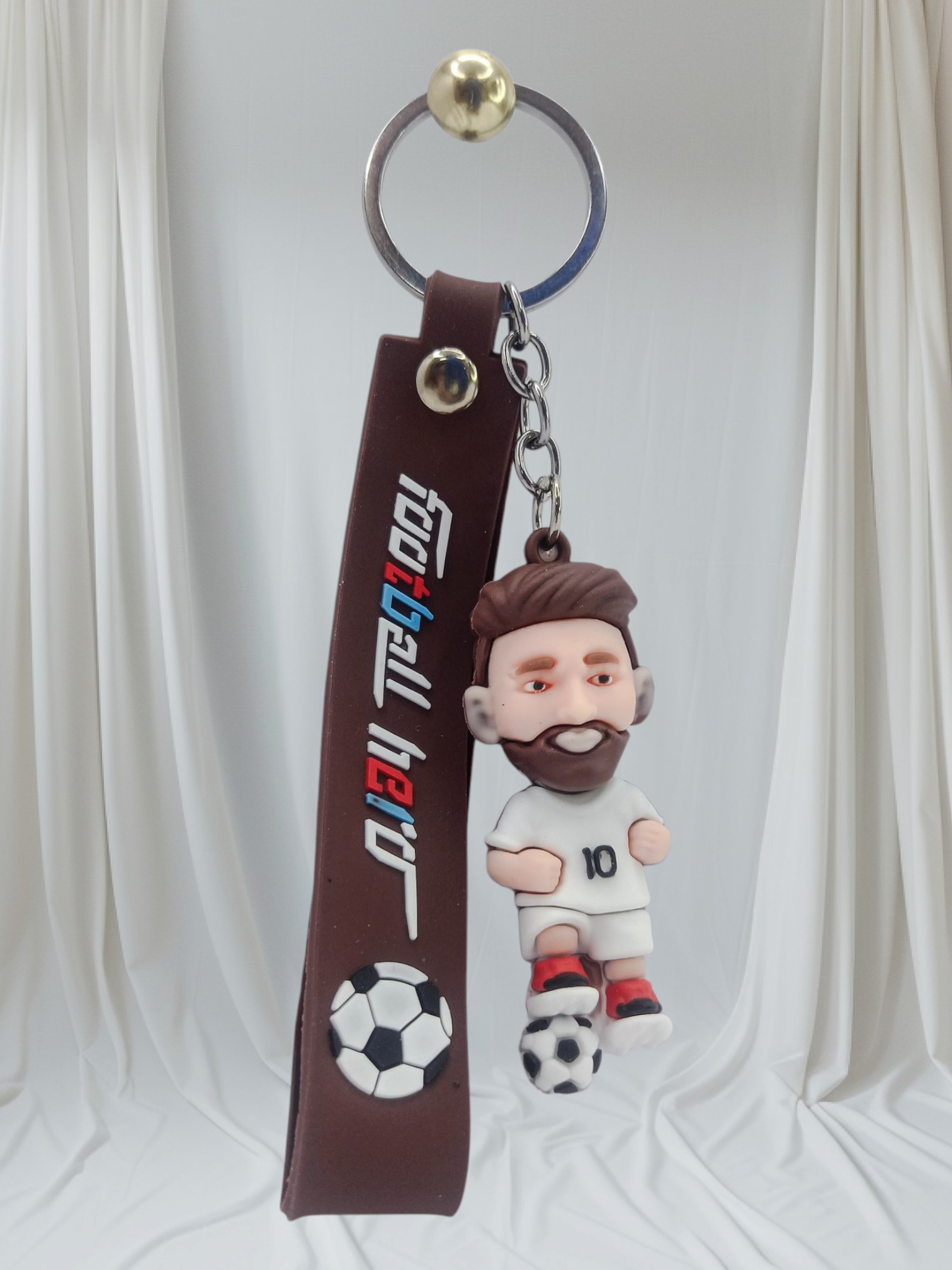 Stylish Messi 3D keychain with football design and rubber strap – perfect gift for fans, kids, and sports lovers.