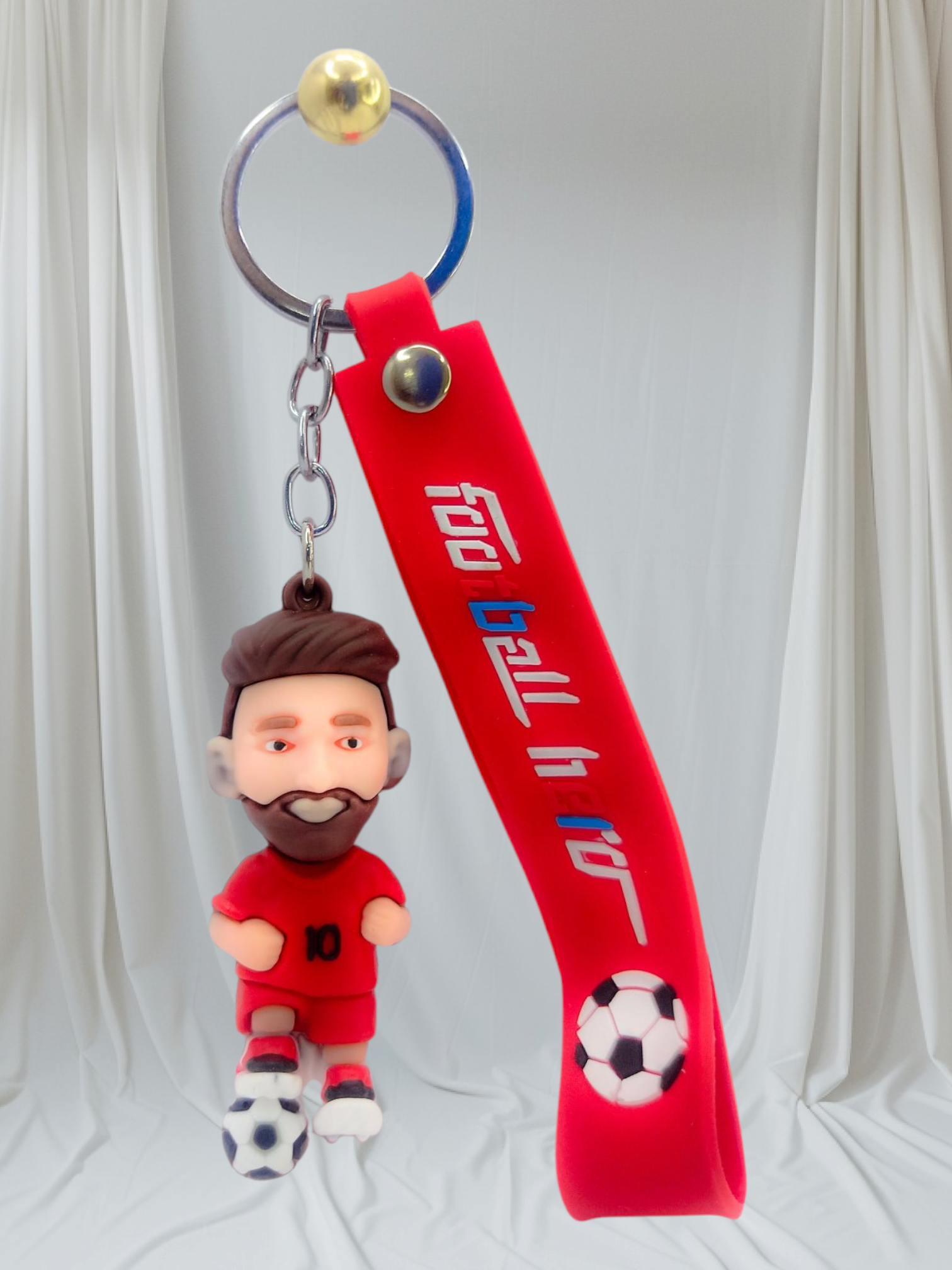Bold red Messi 3D keychain with football design and rubber strap – ideal gift for kids, fans & sports enthusiasts.