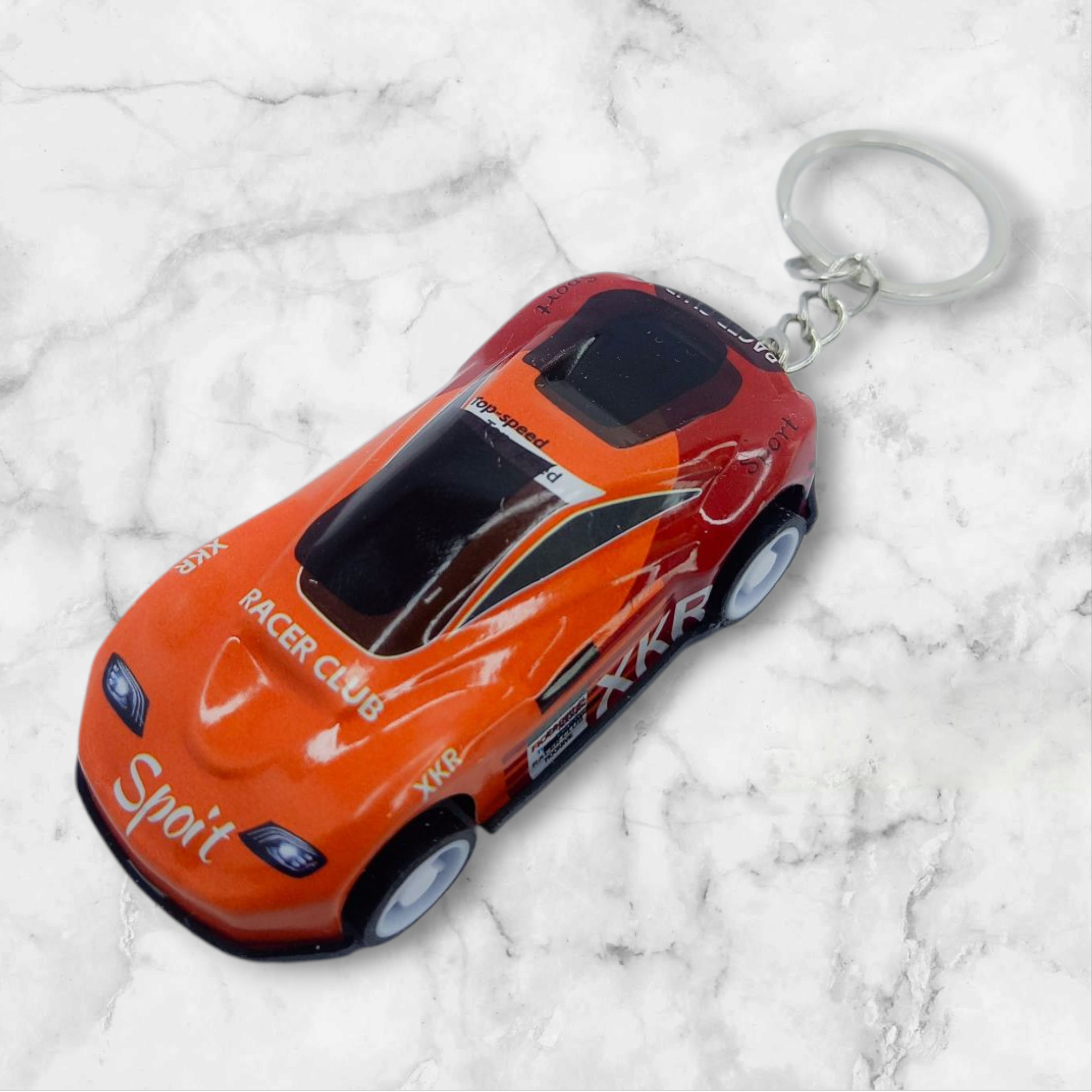 Miniature sports car keychain with sleek design – perfect gift for boys, teens, and car lovers. Stylish, lightweight, and fun to carry.