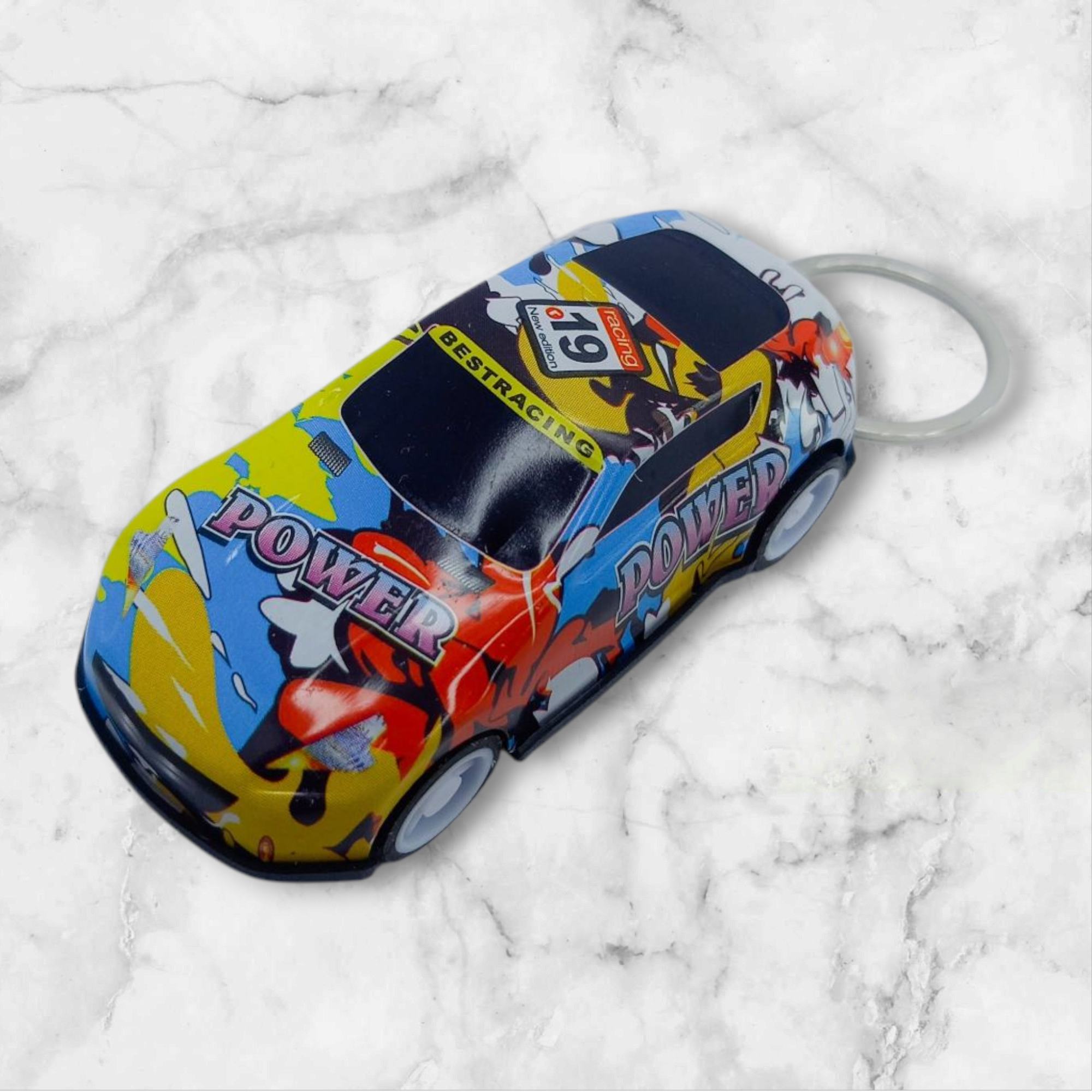Stylish miniature toy sports car keychain with a sleek design – a fun and lightweight gift for boys, teens, and car lovers. Perfect for keys, bags, or collectibles.