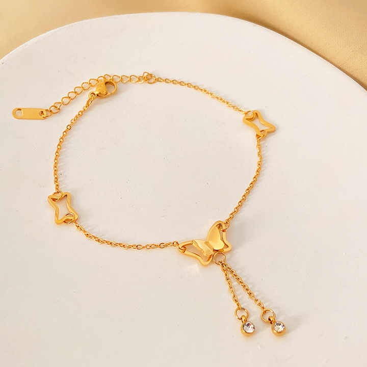 Elegant double butterfly anklet with shiny stones – stylish jewelry for women and girls.