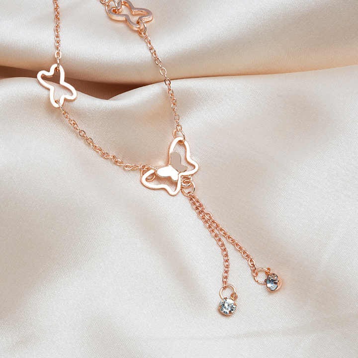 Elegant double butterfly anklet with shiny stones – stylish jewelry for women and girls.