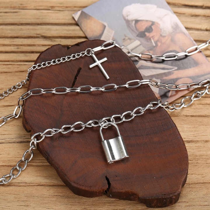 Explore layered grunge aesthetic necklaces with vintage punk chains, lock & cross pendants — stylish goth jewelry for women and men.