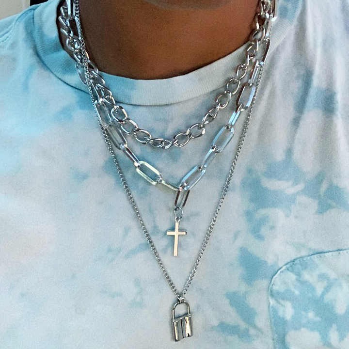 Explore layered grunge aesthetic necklaces with vintage punk chains, lock & cross pendants — stylish goth jewelry for women and men.