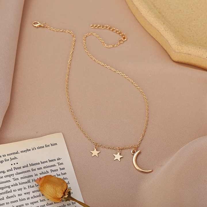 Shine bright with our fashion gold star and moon necklace for women — elegant, lightweight celestial jewelry perfect for daily wear and gifting