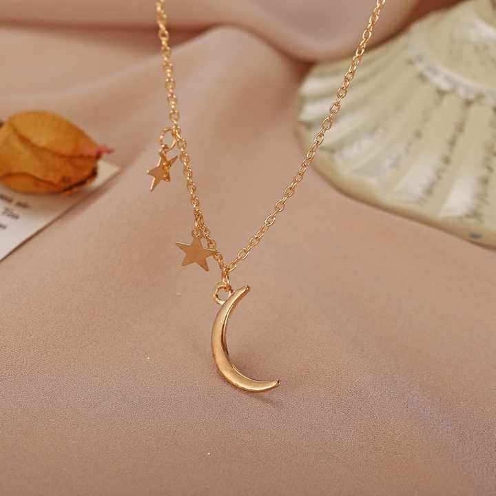 Shine bright with our fashion gold star and moon necklace for women — elegant, lightweight celestial jewelry perfect for daily wear and gifting