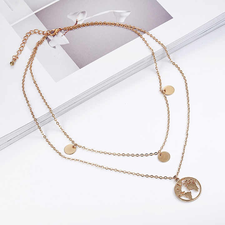 Explore the world with a vintage world map disc necklace — adjustable gold chain jewelry for women, perfect for travelers, dreamers, and everyday style.