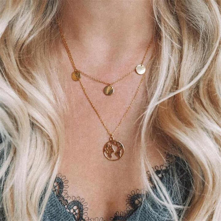 Explore the world with a vintage world map disc necklace — adjustable gold chain jewelry for women, perfect for travelers, dreamers, and everyday style.