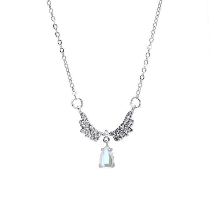 Shop elegant moonstone angel wings pendant necklaces — brass clavicle chain jewelry for women, perfect for daily wear, special occasions, and gifting.