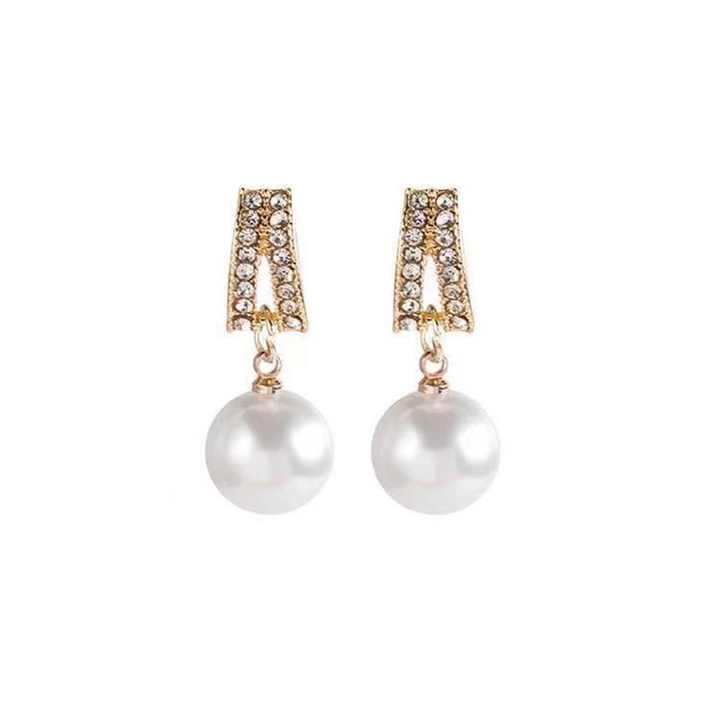 Elegant light ivory pearl drop earrings for weddings — platinum plated with sparkling cubic zirconia, perfect bridal jewelry for timeless beauty and grace.