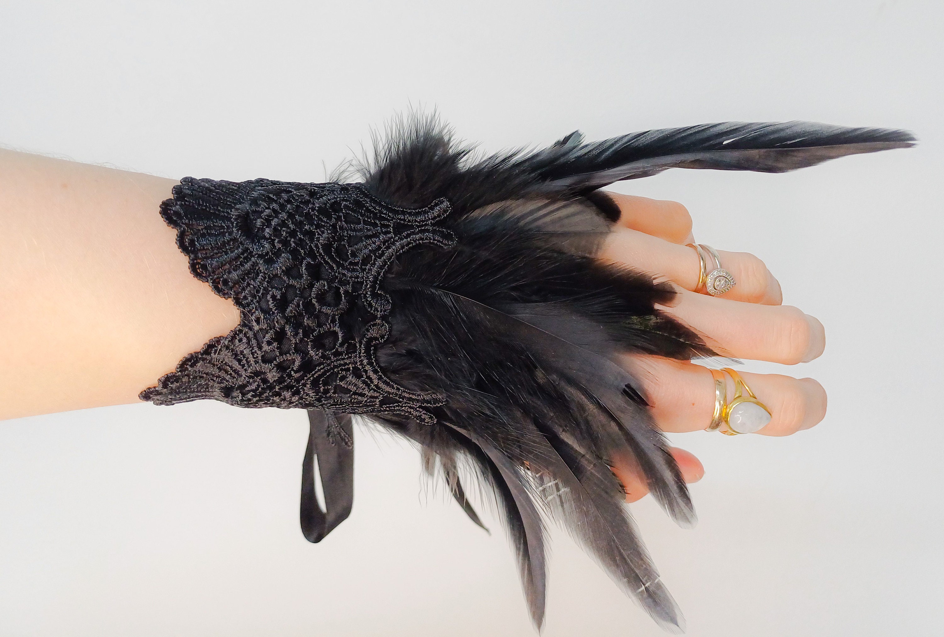 Feather and lace cuffs