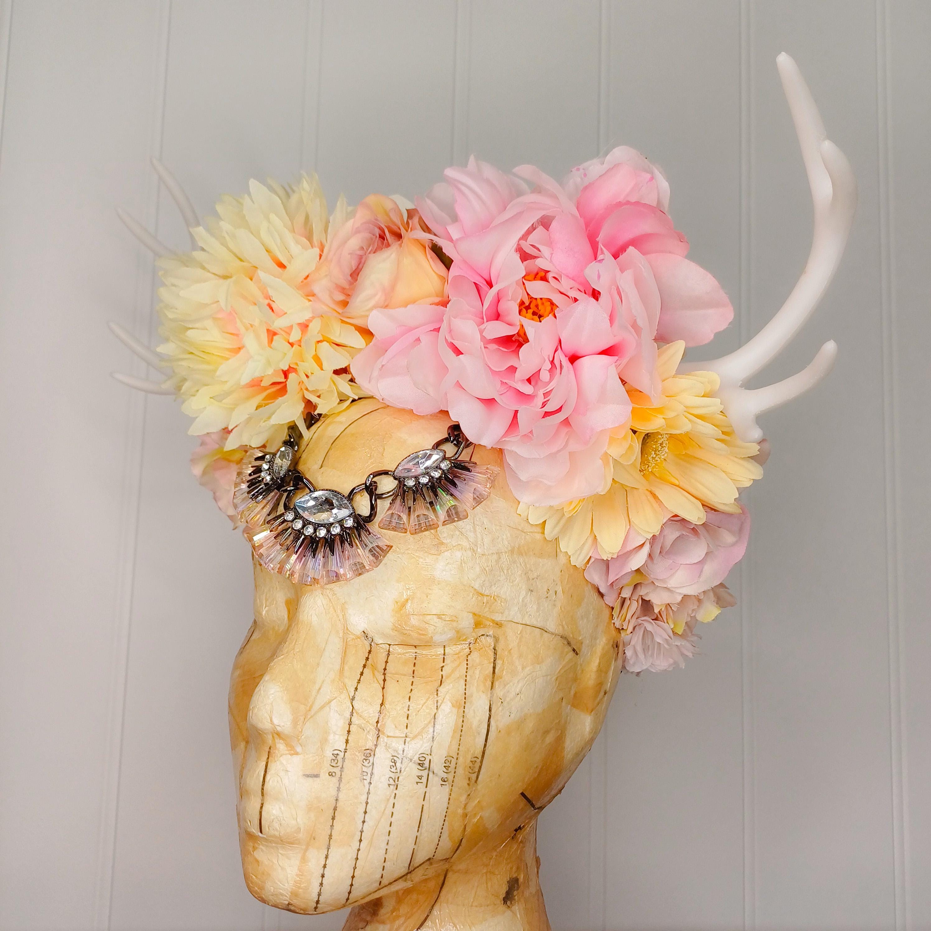 Floral headdress with white horns 