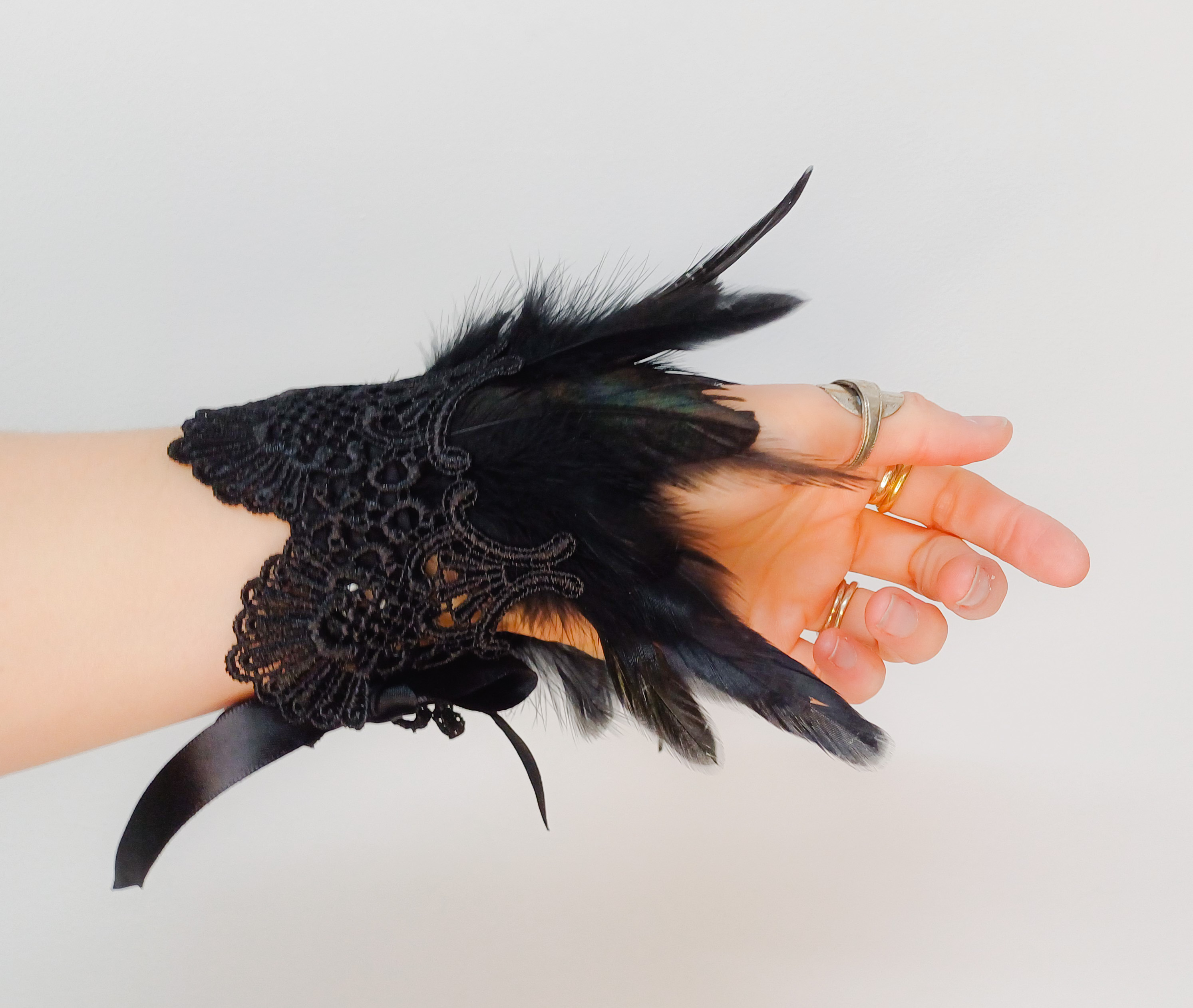 Feather and lace cuffs